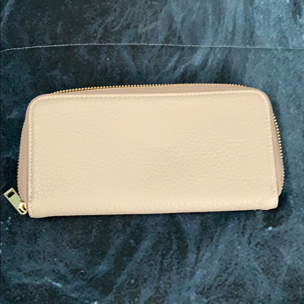 Grey Wallet with brown interior.